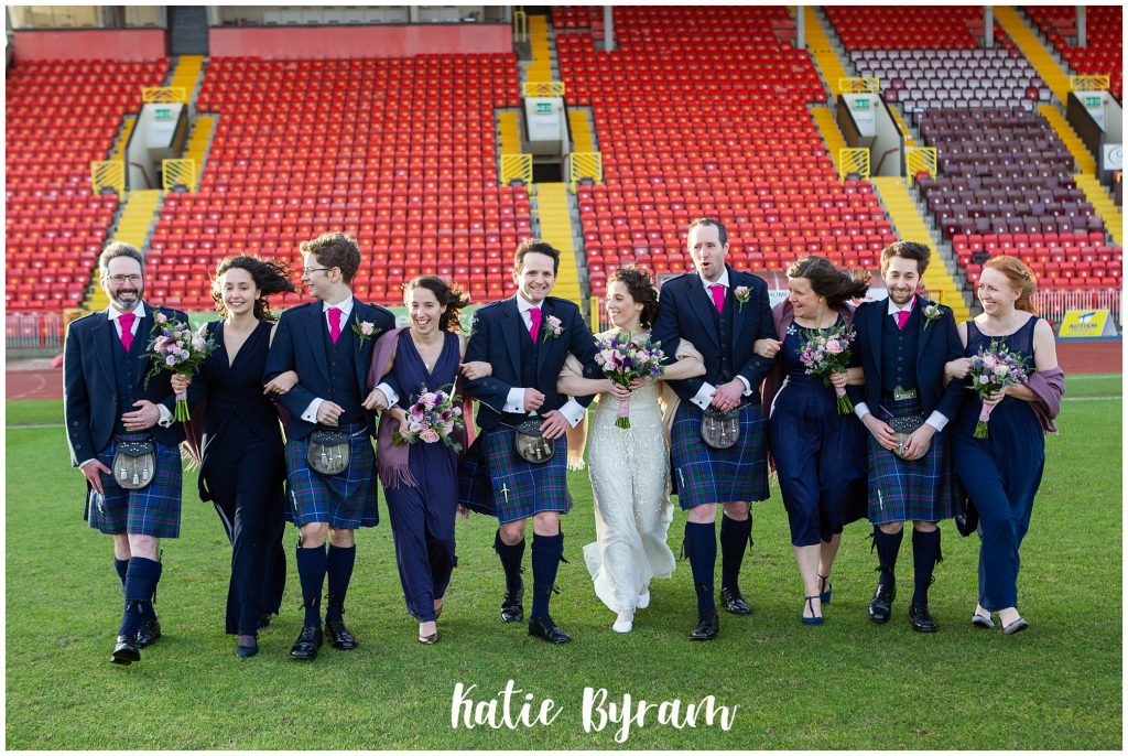 huddersfield wedding photographer, katie byram photography, holy trinity church gateshead, gateshead stadium wedding, bouncy castle wedding